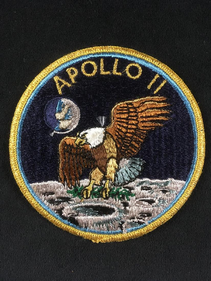 NASA Memorabilia Vintage Apollo 11 Mission Patch: NASA Memorabilia, Vintage Apollo 11 Mission Patch; this finely embroidered patch appears to be a "Grumman" patch produced by Dallas Cap and Emblem. It shows gold colored thread in the boarder and silv
