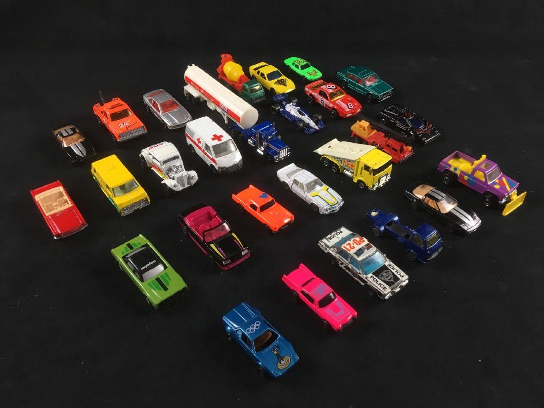 Mixed Lot of Toy Cars Diecast and Plastic 27 Pieces: Mixed Lot of Toy Cars, Diecast and Plastic, 27 Pieces; lot includes Mojorette, Matchbox International, Hot Wheels, and many without marks. The yellow splish splash van is marked "Yatming". Please revi