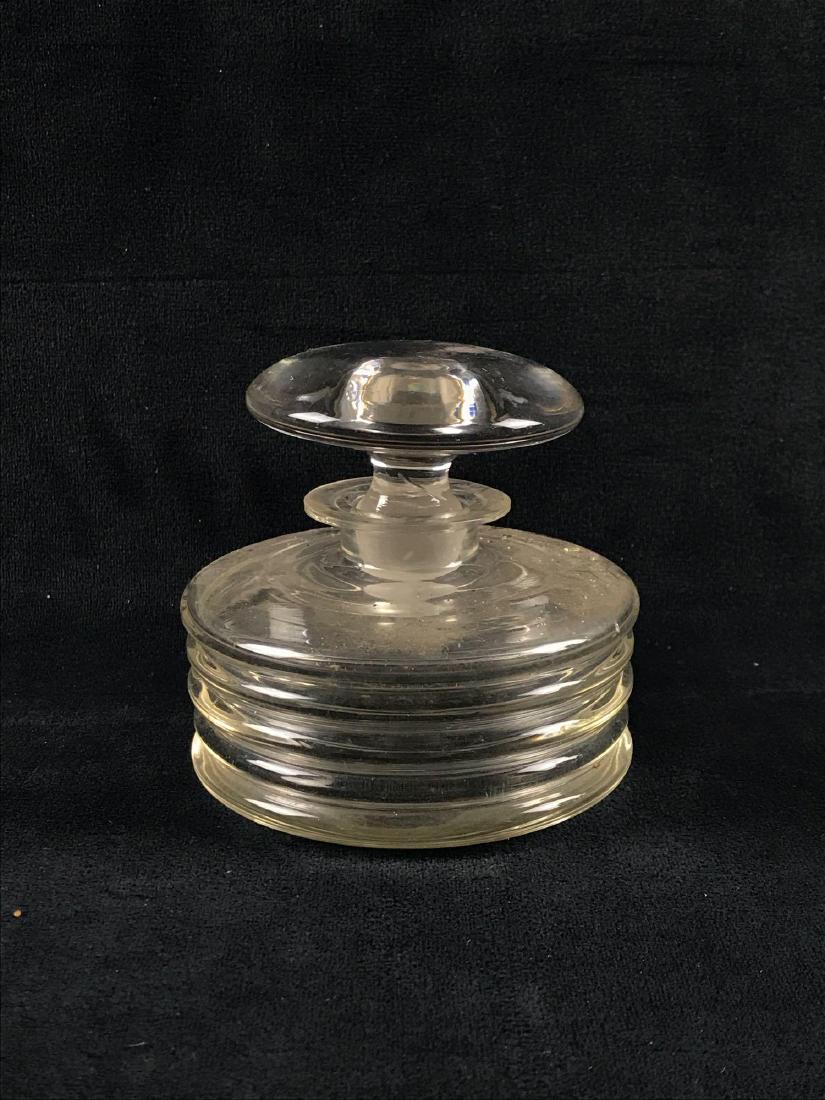 Vintage Art Deco Style Perfume Bottle: Vintage Art Deco Style Perfume Bottle; A very unique piece in excellent condition, just needs a little cleaning. It comes with two pieces total and measures at approximately 3 1/4" H x 3 1/4" D.&