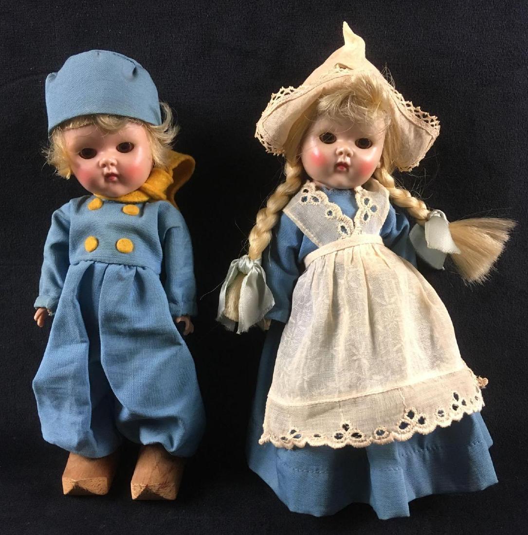 Vogue 1950s Ginny Holland Boy Little Dutch Girl Plastic: Vogue 1950s Ginny Holland Boy Little Dutch Girl Plastic Dolls. This doll pair is in good condition. They both have traditional Dutch outfits and blonde hair with brown eyes. The doll's clothing have a