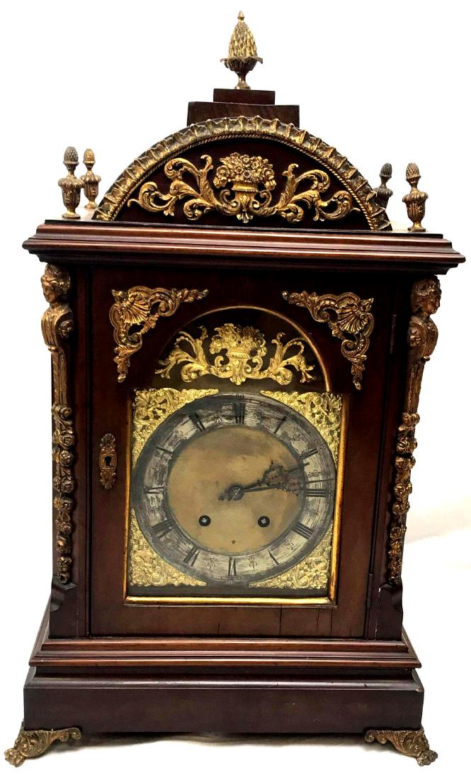 Antique Winterhalder Hoffmeier German Bracket Clock: Here is a good Ting-Tang bracket clock by the renowned German maker Winterhalder & Hoffmeier circa 1870. It is encased in an oak case with brass surrounds. There is rich detailed ormolu acc
