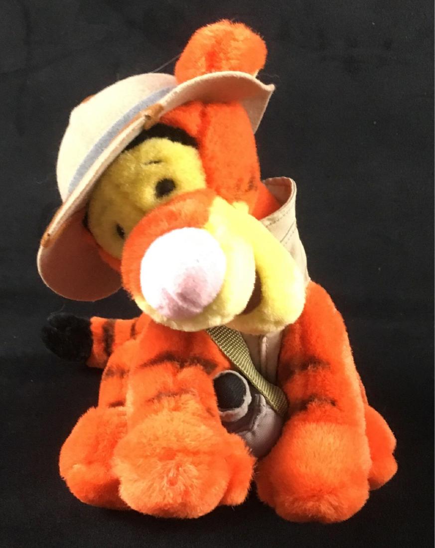 Walt Disney Collectible Safari Tigger Plush: Walt Disney Collectible, Safari Tigger Plush; Tigger from Winnie the Pooh dressed for a visit to Animal Kingdom with safari vest, binoculars and safari hat. ANd the original tag from Walt Di