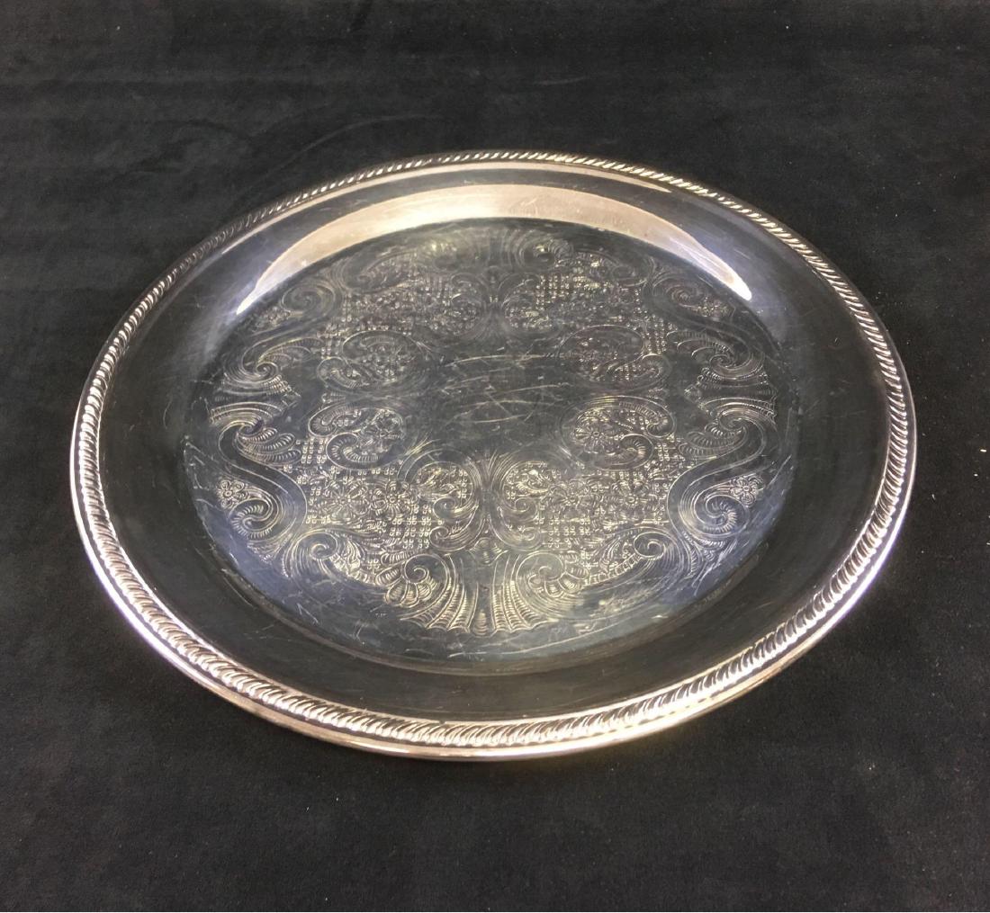 FB Rogers Silver Plate Serving Tray Marked: FB Rogers Silver Plate Serving Tray, Marked; a large silver plate tray, shows the Roger's mark. In good condition, the surface shows some minor scratching, apparently from use. It measures 1/2" H x 12