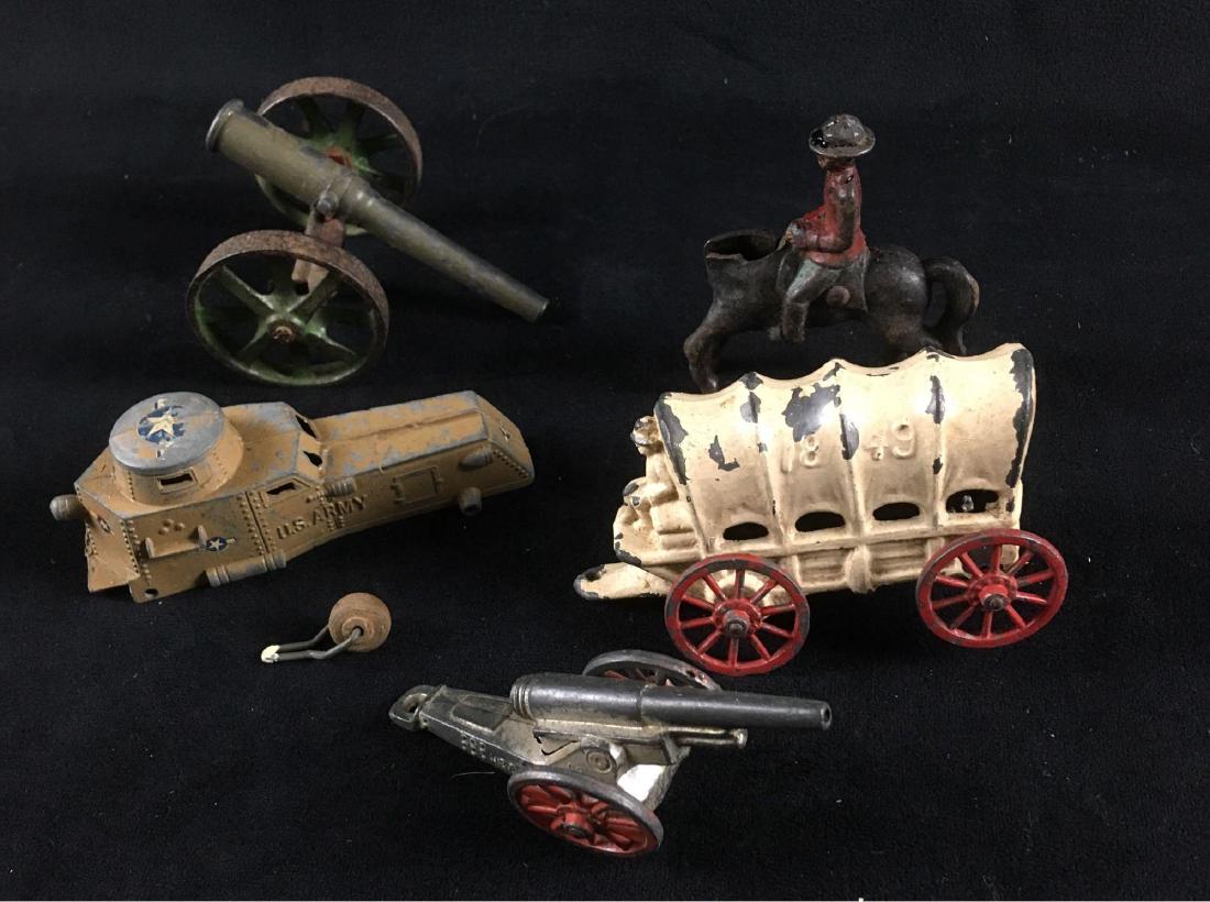 Miscellaneous Collection of Diecast Toys: Miscellaneous Collection of Diecast Toys; this collection includes 2 artillery pieces, an armored car marked "Tootsie Toy', a covered wagon marked "1849", a Canadian Mountie on a poor horse with put a