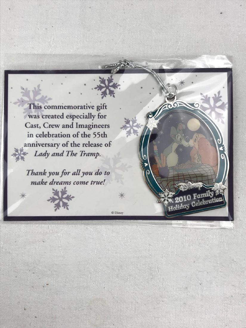 Disney Commemorative Lady And The Tramp Ornament: Disney Commemorative Lady And The Tramp Ornament; This ornament dated 2010 was especially made for the Cast, Crew, and ImagineersÂ in celebration of the 55th anniversary of the release of Lady and T