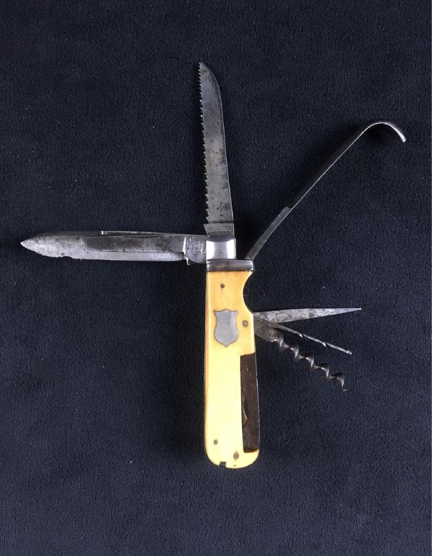 Antique George WostenholmÂ I XL Folding Horseman: Antique George WostenholmÂ I*XL Folding Horseman Farriers Knife; this knife is well marked George Wostenholm, Sheffield. It shows a bone handle. It is in good condition, all tools are attachedÂ ex