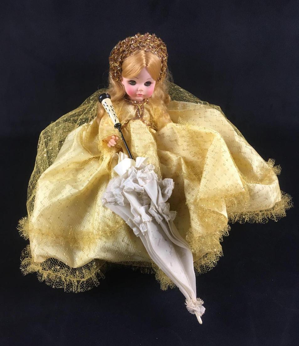 Madame Alexander Sleeping Beauty Doll: Madame Alexander Sleeping Beauty Doll. This doll is in great condition. Doll's clothing and body have hardly any signs of wear or dirt. Doll has a yellow dress and sequined crown. The doll's hair is m