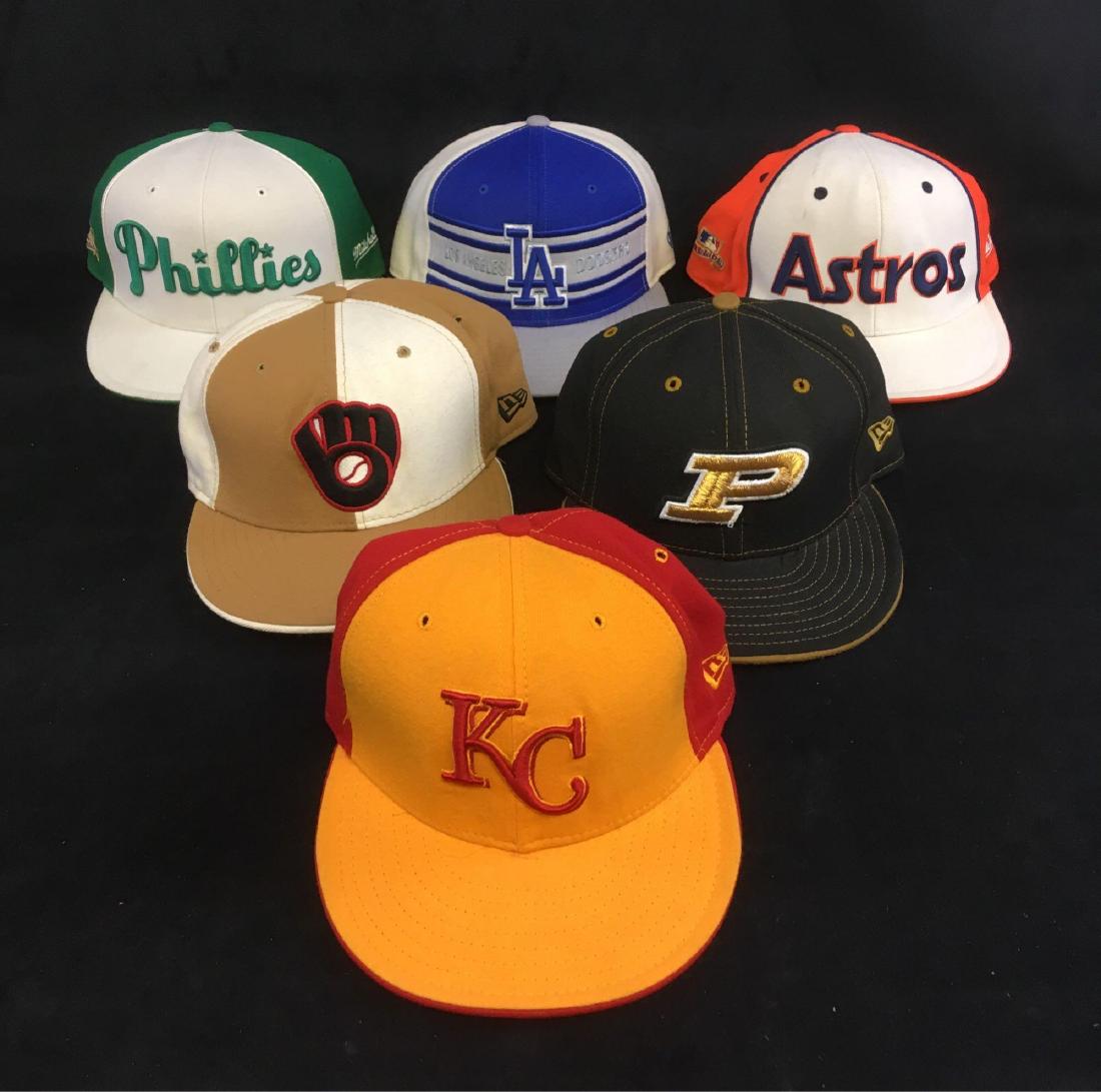 Lot of 6 Official Baseball Team Caps: Lot of 6 Official Ball Caps; all officially sanctioned and high quality. Teams include the Brewers, the Astros. the Royals, the Dodgers, the Phillies , and the Perdue Boilermakers. Say what? The Boile