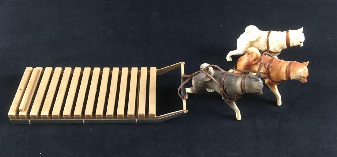 Vintage GI Joe Arctic Explorer Dog Sled and 3 Dog Team: Vintage GI Joe Arctic Explorer Dog Sled and 3 Dog Team, Circa 1960's; a must have if you expect GI Joe to run the Iditarod. The lot includes his best dogs, the white, brown and dark grey. The team is 
