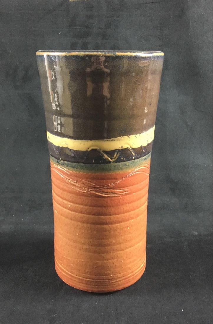 Art Pottery Handmade Earthenware Vase Signed: Art Pottery Handmade Earthenware Vase, Signed; a very nice substantial piece in earth tones. It stands 11" H x 5 3/4" DIA. A nice piece.