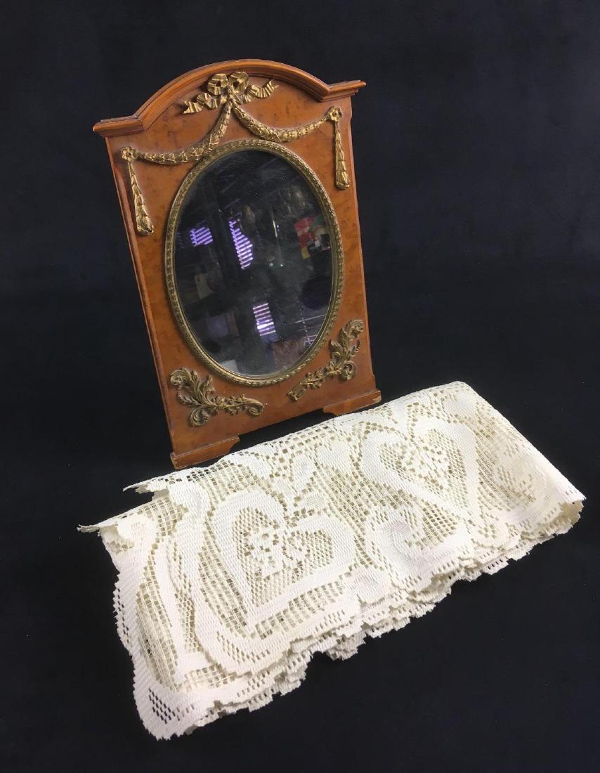 Antique Dressing Table Mirror and Lace Table Runner: Antique Dressing Table Mirror and Lace Table Runner. This set is in good condition. The mirror frame is made of tiger's eye maple. The mirror comes with a lace table runner that has hardly any sign of