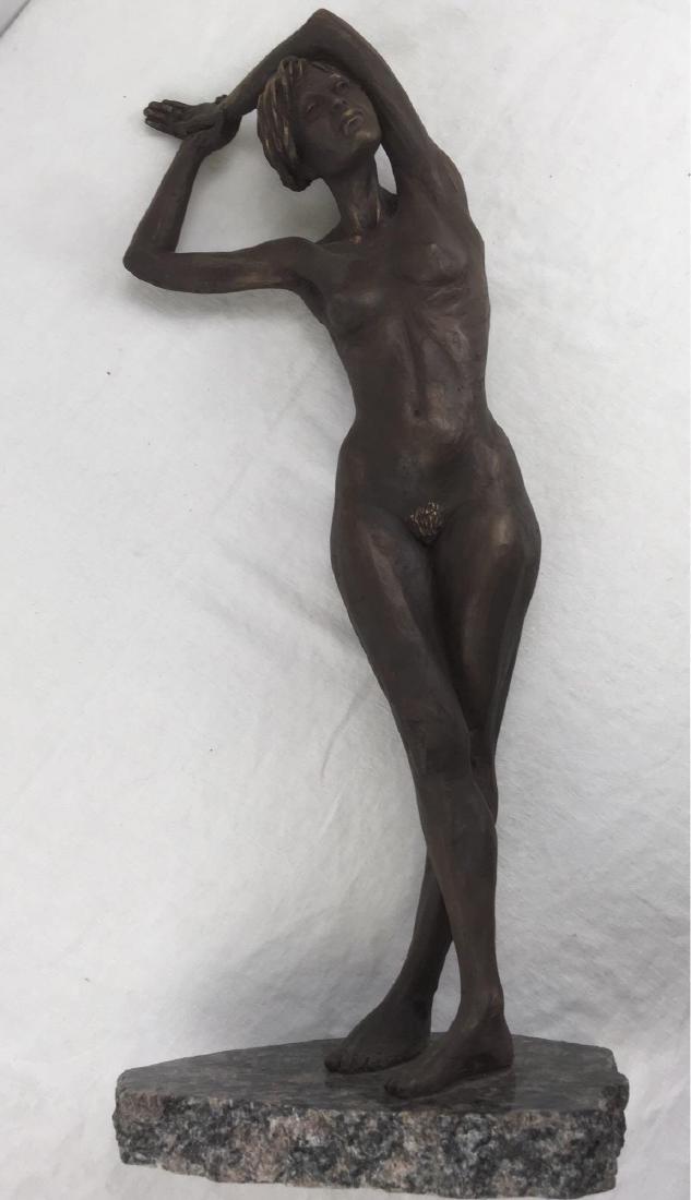 Ancolie Dry Stone Sculpture by Daniel Beauchamp, 2002: Statue of woman on marble, limited edition 37/120. This elegant statuary measures 23" H, 9.1/2 W, base is 1.1/4" thick. COA included.