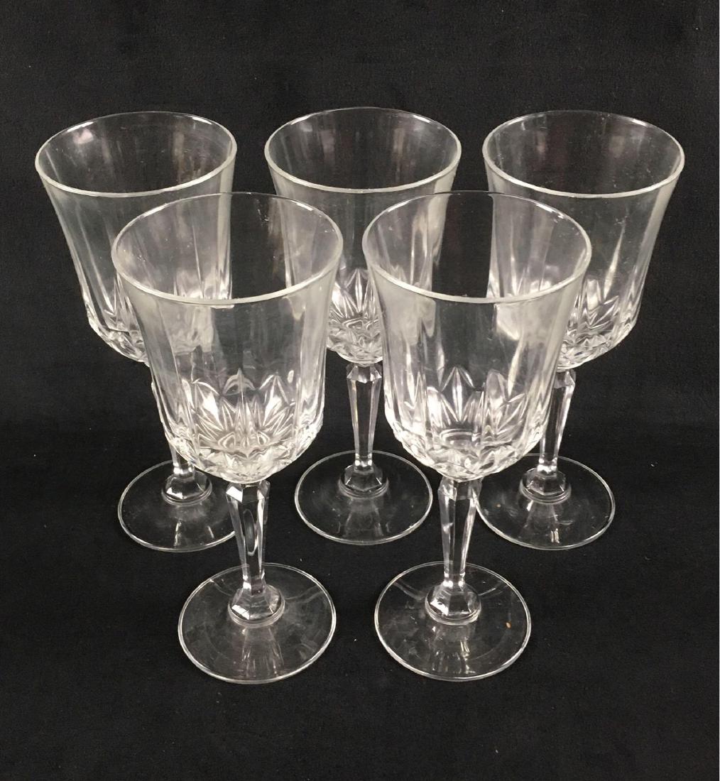 Lot of 5 Vintage Clear Crystal Wine Goblets: Lot of 5 Vintage Clear Crystal Wine Goblets; these are not marked, they show a hexagon shaped stem. All are in very good condition with no chips or cracks noted. Each measures 8" H x 3 3/8" DIA.Â