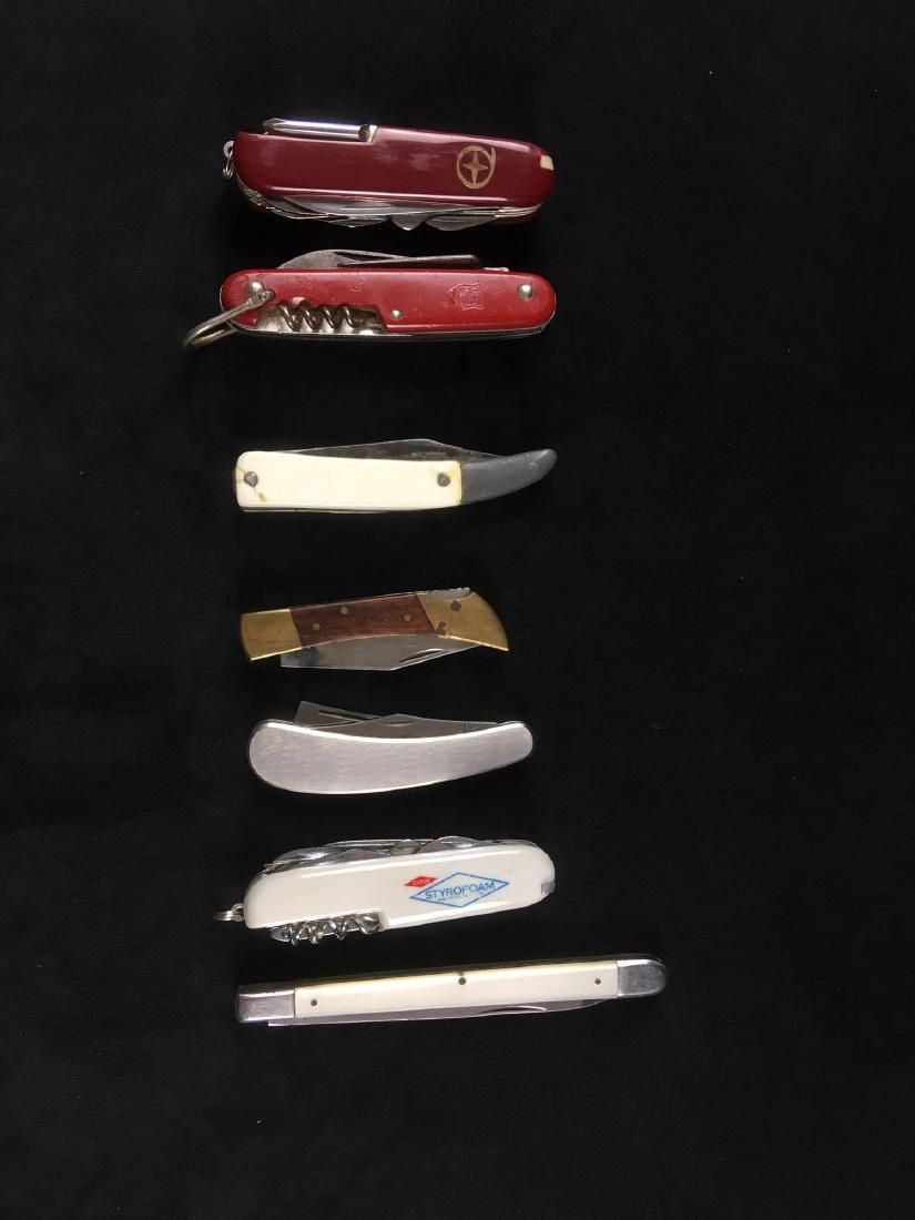 Collection of 8 Folding Pocket Knives: Collection of 8 Folding Pocket Knives; lot includes 1) Swiss Army style knife marked "China" with 13 blades/tools including tweezers and toothpick, very good condition, measures 3 1/2" L closed, 2)Â�