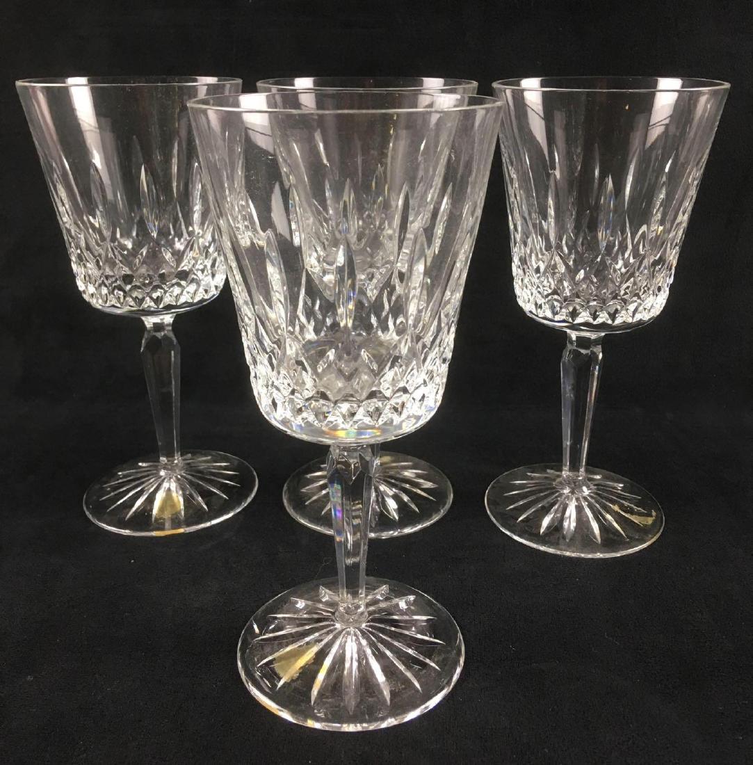 4 Clear Crystal Stemware Wine Goblets with Lismore: 4 Clear Crystal Stemware Wine Goblets with Lismore Pattern. These wine goblets are in great condition. They look like Waterford glasses but the manufacturer is unknown. One glass has a sticker with an