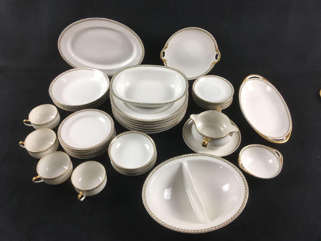 38 Piece Set of Haviland and Co. Limoges Dinnerware: 38 Piece Set of Haviland and Co. Limoges Dinnerware with The Lisbon Pattern. This set is in fair condition overall. A few of the dessert plates has a small chip out of the outer rim, but otherwise the