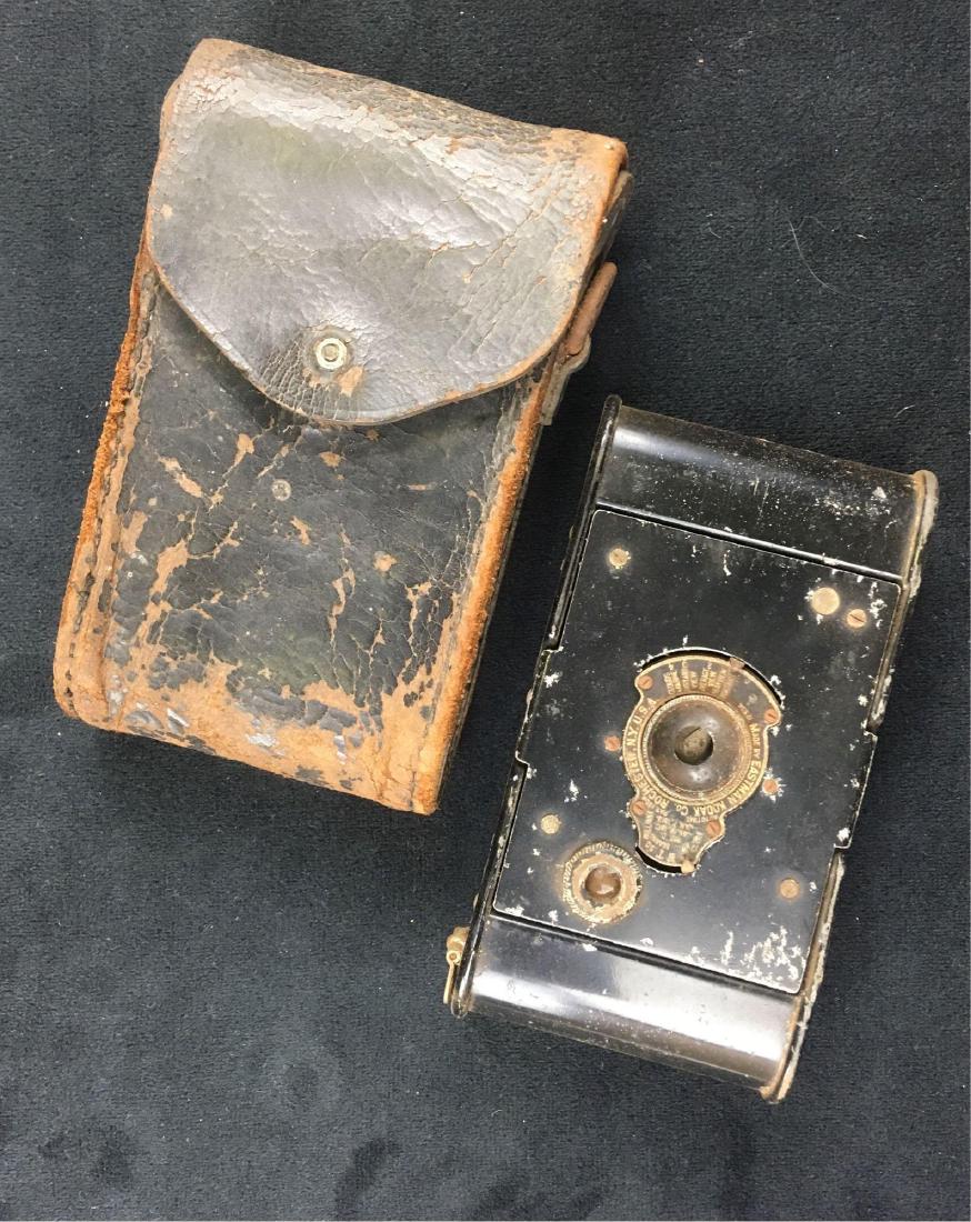 Antique BT50 Eastman Kodak Pocket Camera: Circa 1913 Kodak model BT-50 vest camera with leather case. This is one cool little camera that has lots of patina. We're not positive if it's useable or just something for the film aficionado to disp