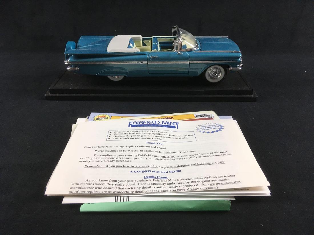 Fairfield Mint Chevrolet 1959 Impala: Fairfield Mint Chevrolet 1959 Impala. This model car is in great condition. It is included in the original box with paperwork. The car is light blue die-cast metal with a black plastic base. Has a con