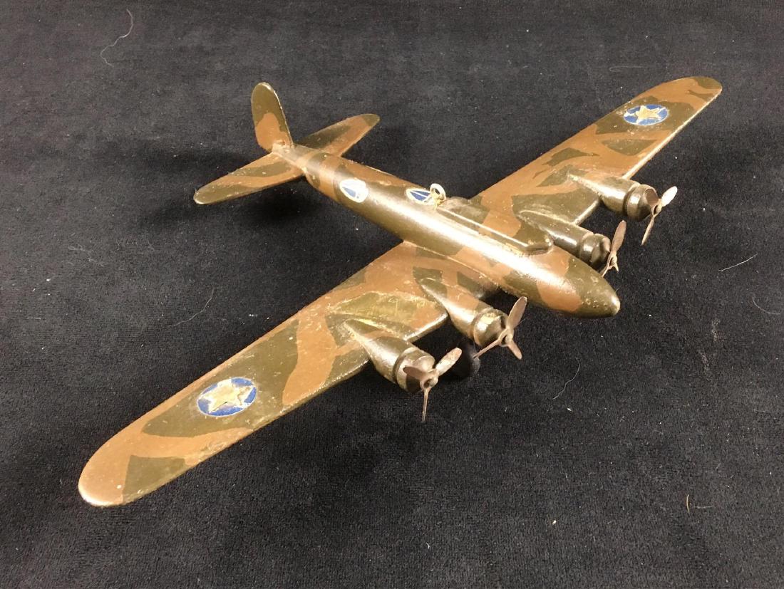 Vintage Hand Carved WW II B 17 Bomber: Vintage Hand Carved WW II B 17 Bomber; this period piece appears to be an early version of the B 17 Flying Fortress (Y1B-17?). The gun blisters are represented by decals. The workmanship on this woode