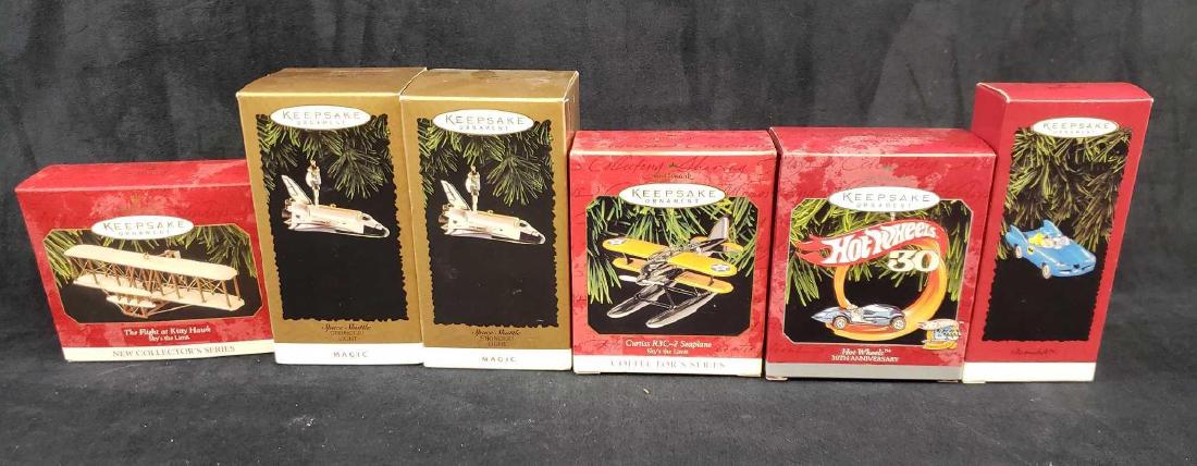 Lot of 6 Hallmark Keepsake Plane Shuttle and Car: Lot of Hallmark Keepsake Plane Shuttle and Car Ornaments. These ornaments are in excellent used condition. The ornaments are still in the original box with packaging and paperwork. Items included in t