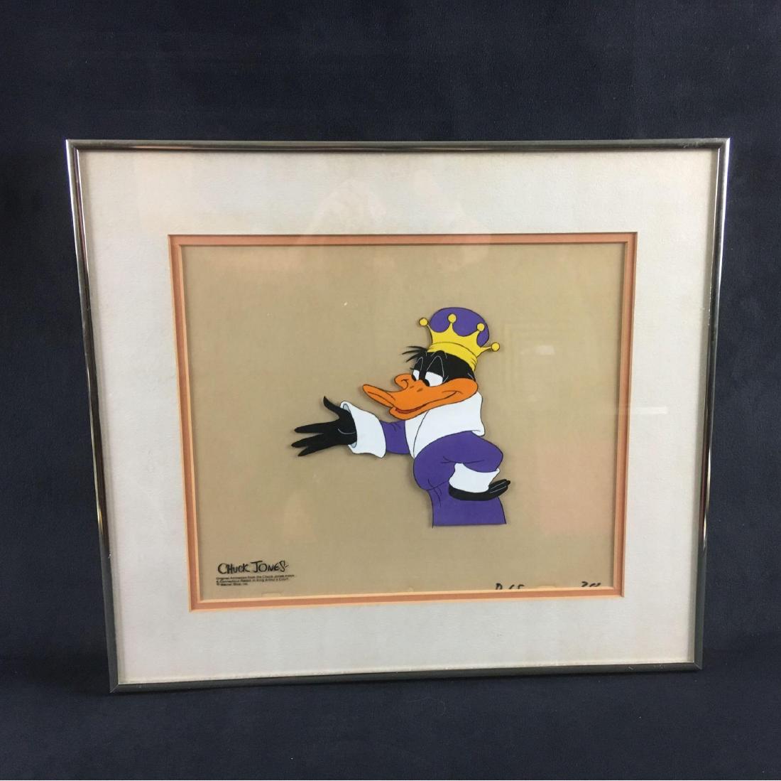 Original Chuck Jones Hand Painted Animation Cell A: Original Chuck Jones Hand-painted Animation Cell, A Connecticut Rabbit in King Arthur's Court, 1978; a great rendering of Daffy Duck in kingly garb. The animation cell is double matted and glazed in a