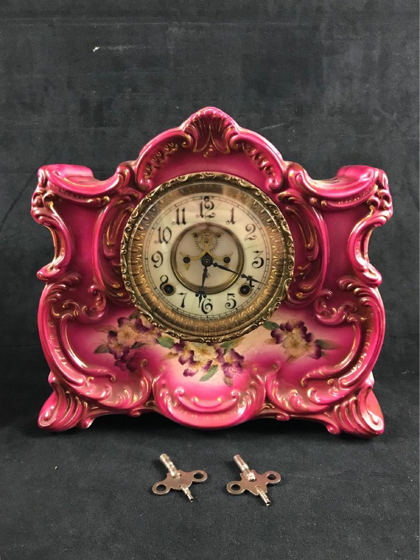 Antique Asonia Ossipee Pink Mantle Clock: Antique Asonia OssipeeÂ Porcelain Pink Mantle Clock; A beautiful hand painted antique clock circa 1910 includes the pendulum and 2 keys. The porcelain has some crazing due to age and the face has so