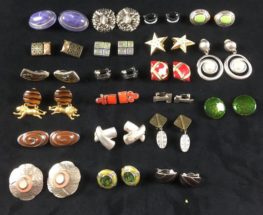 21 Pair Costume Jewelry Clip On Earring Set: 21 Pair Costume Jewelry Clip On Earring Set. This set is in fair condition. Two pairs have a fake gemstone missing. Some light scratching on a few pieces. The pieces are all relatively similar in look
