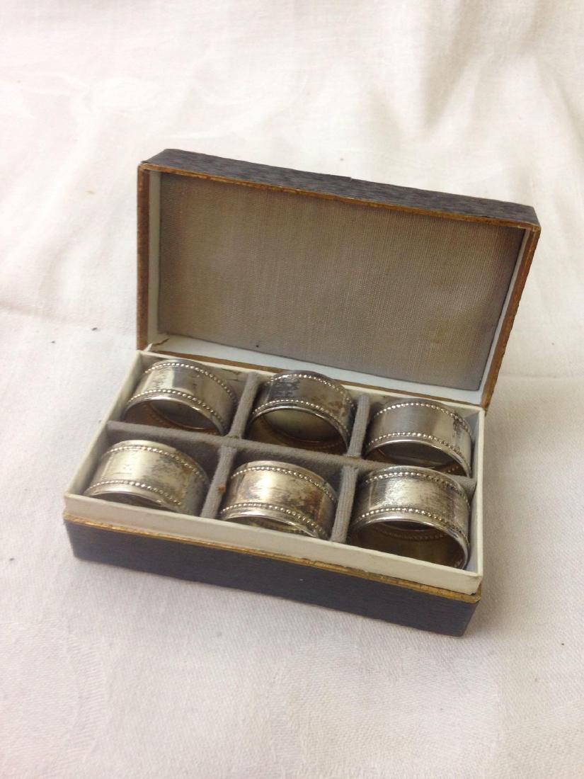 Set of 6 Vintage Silver Napkin Rings, Marked 800: et of 6 Vintage Silver Napkin Rings, Marked 800; these vintage napkin rings show a nice beaded design. Each is marked 800. They are in very good condition and measure 5/8" x 1" DIA. Total weight of al