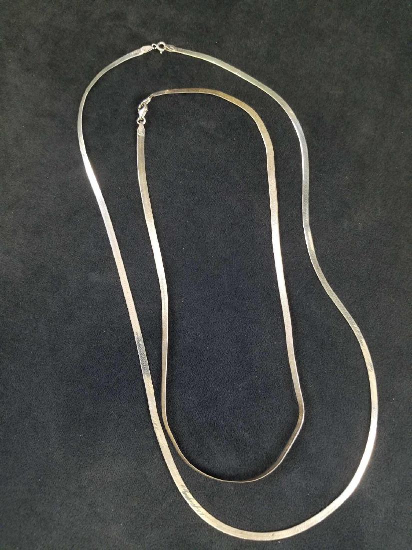 16 and 23 inch Sterling Silver Snake Chain: These .925 Sterling Silver necklaces are from Italy. One is a 16" chain length in fair condition with tarnishing and a separation on the snake chain where the clasp latches on (Please see images); wei