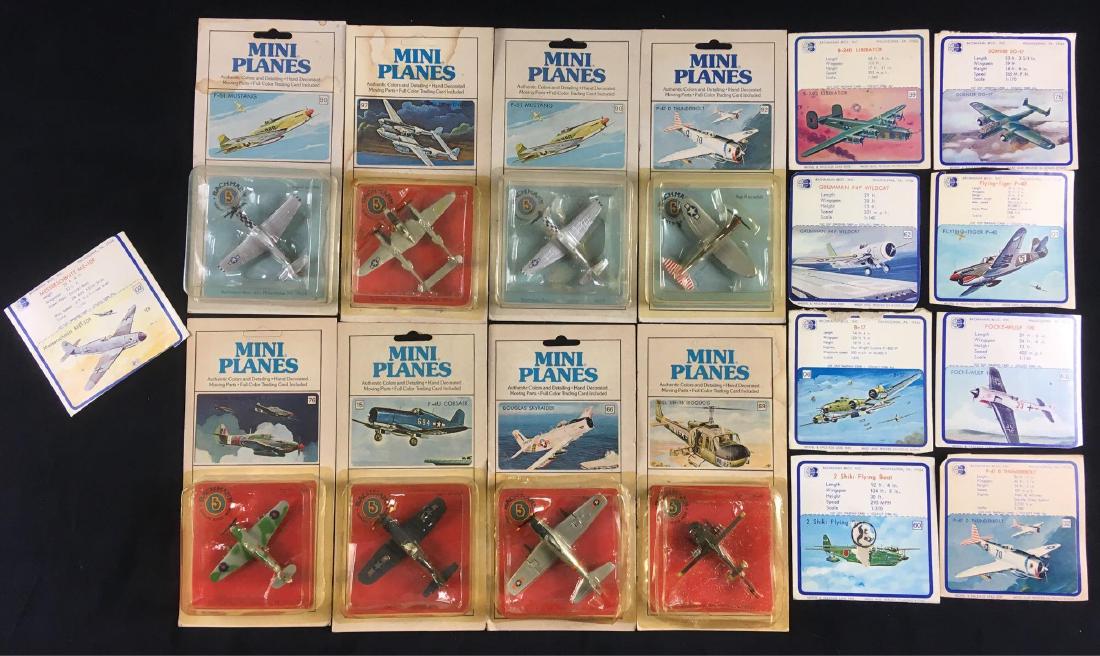 Collection of 8 Vintage Bachmann Mini Planes in: Collection of 8 Vintage Bachmann Mini Planes in Original Packaging and 9 Bachmann Packaging Trading Cards; the aircraft are P-47 Thunderbolt, P-38 Lightning, Douglas Skyraider, Hawker Hurricane IIC, F