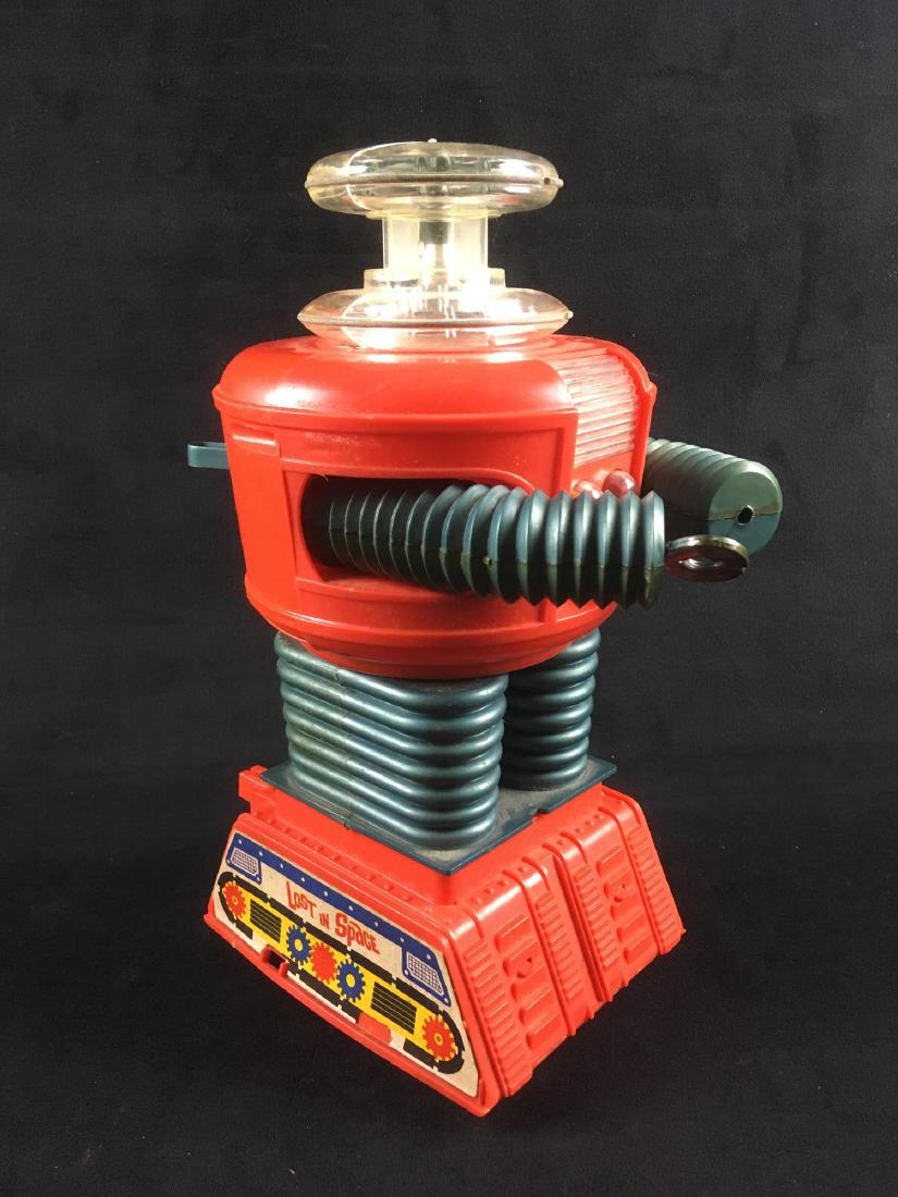 Vintage Lost in Space Robot by REMCO 1966: Vintage Lost in Space Robot by REMCO, 1966; a large version of Robot B 9. It is in fair condition, issues noted include a missing left claw and when tested, the electronics did not function. The finis