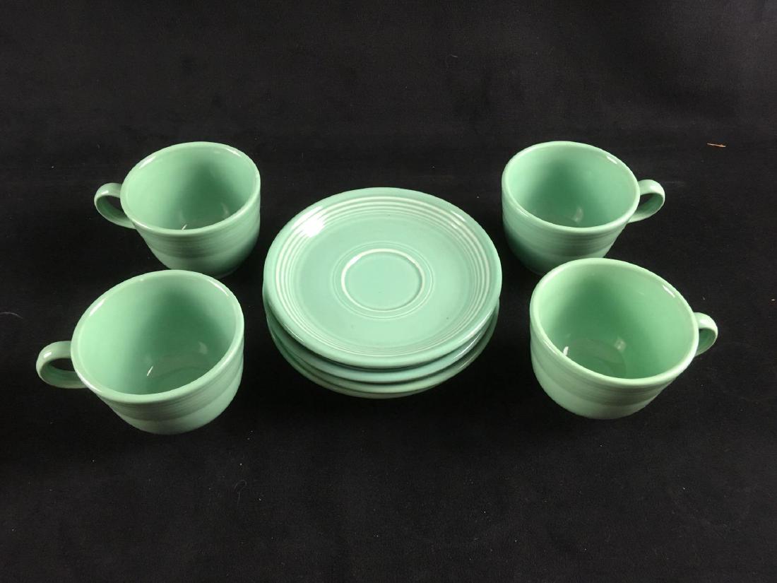 Mid Century Fiestaware Coffee Set: Fiesta by Homer Laughlin mint green coffee set, 4 cups and 4 saucers. All in nice condition. 6" D plates, 2.3/4" tall cups.