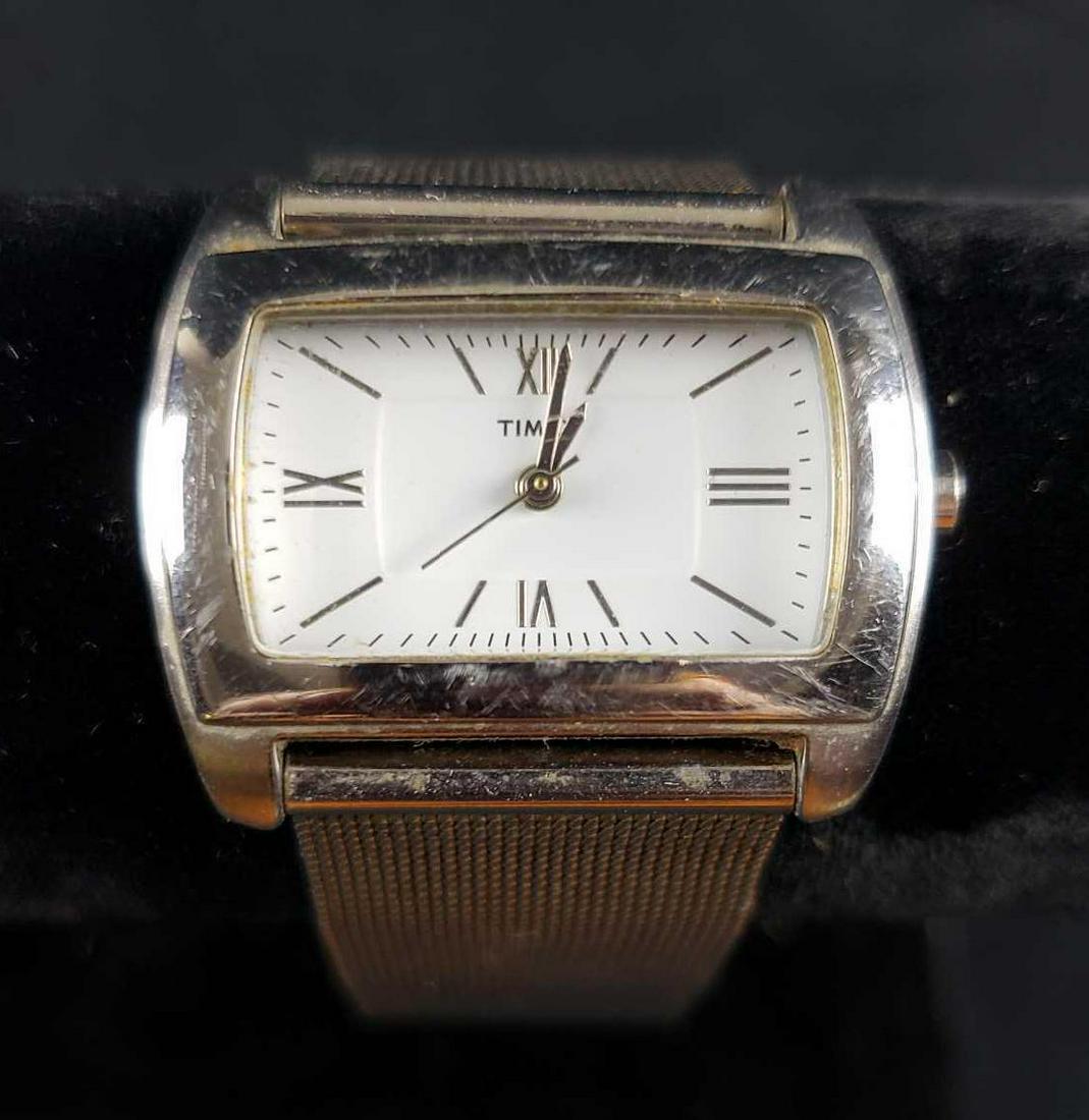 Men's Timex Dress Watch: Timex , SR - 521 SW Silver Band, Stainless Steel It is in fair used condition. Watch has not been tested and may need a battery. Â