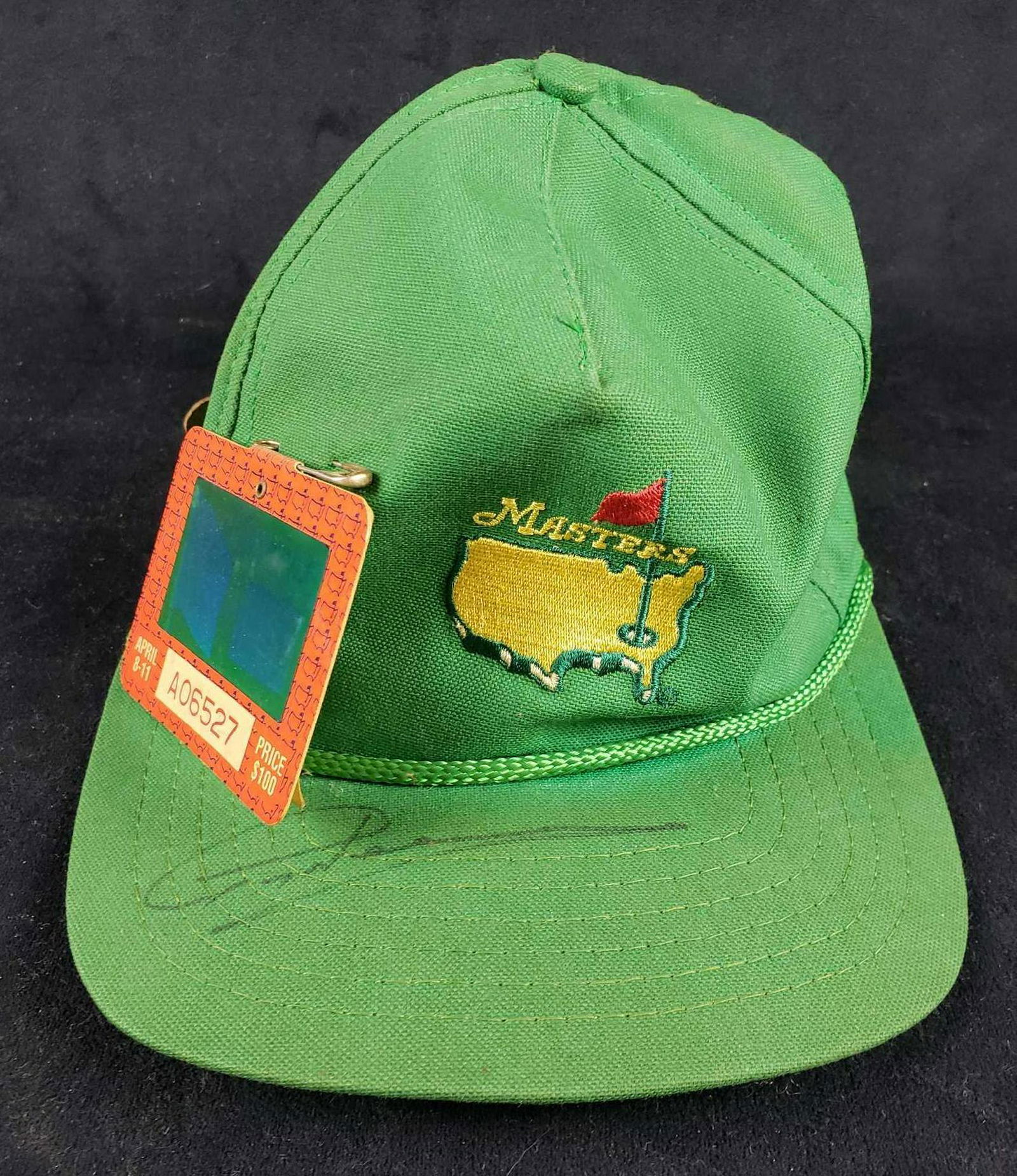 Green 1993 Augusta National Golf Club Masters SIGNED: Green 1993 Augusta National Golf Club Masters SIGNED Baseball Hat and Badge. This signed hat is in great used condition. The hat has a lenticular admission badge attached by safety pin. The hat has so