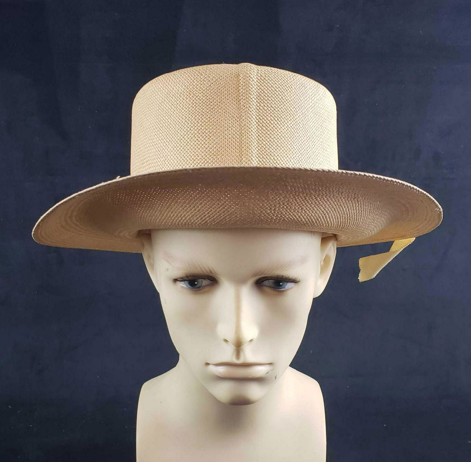 Vintage Woman's Boater Style Straw Hat: Vintage Woman's Boater Style Straw Hat; a wide brim boater hat woven from a very fine straw. It shows a label marked "union Made". The hat is clean and in very good condition. It measures 12" W x 13"