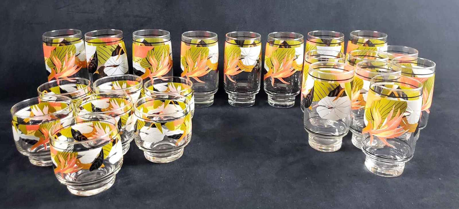 Discontinued Set of 22 Sango The Larry Laslo Collection: Set of 22 Sango The Larry Laslo Collection Maui 1986 Glasses. This set of glasses is in great used condition. There is no known damage to the glasses such as chips, cracks or other imperfections. The