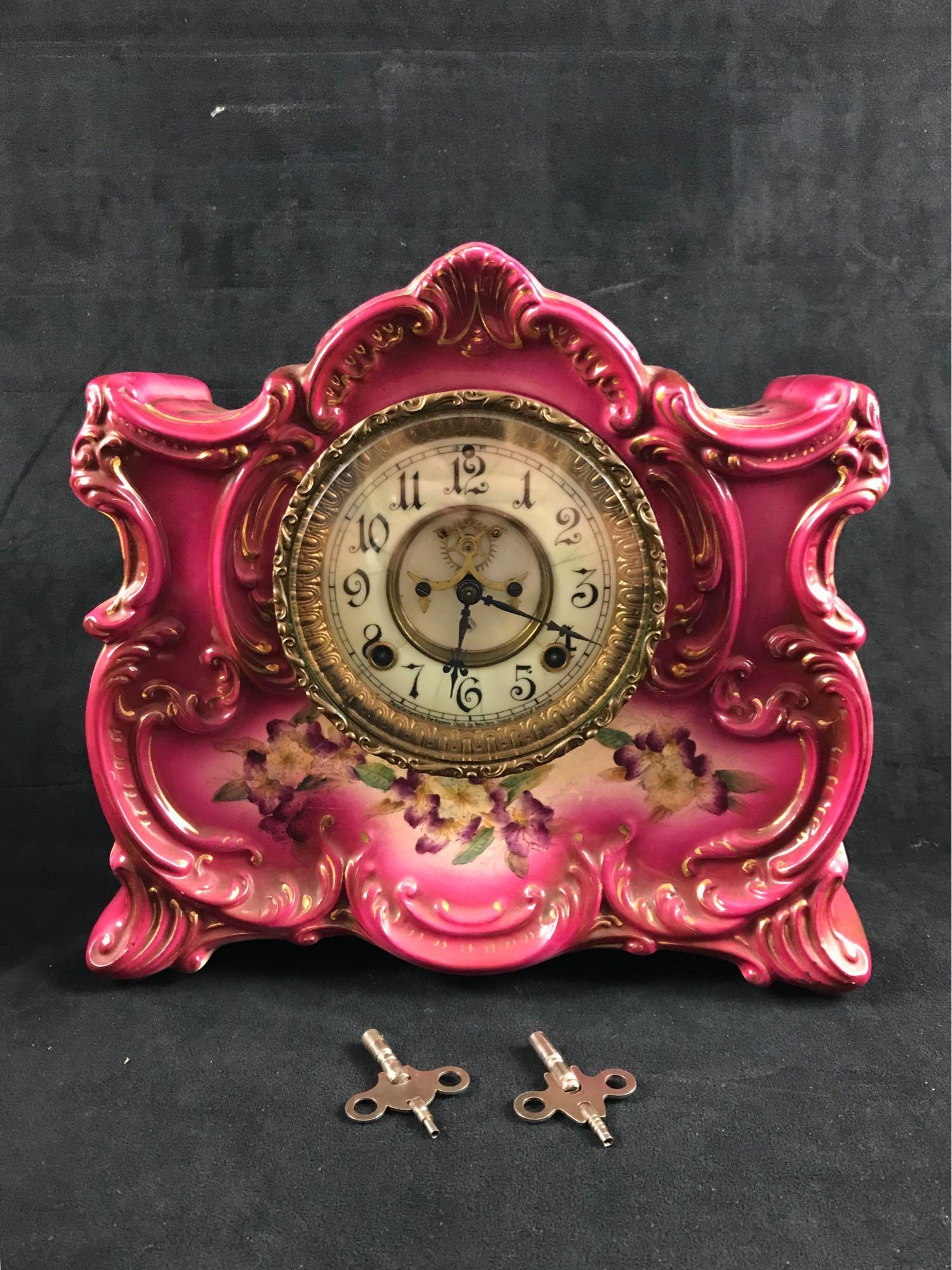 Antique Asonia Ossipee Pink Mantle Clock: Antique Asonia OssipeeÂ Porcelain Pink Mantle Clock; A beautiful hand painted antique clock circa 1910 includes the pendulum and 2 keys. The porcelain has some crazing due to age and the face has so