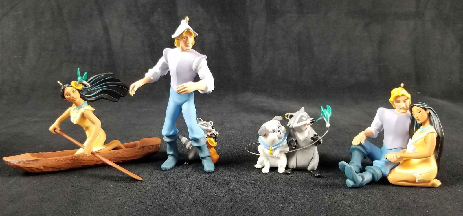 Hallmark Keepsake Lot of 4 Disney Pocahontas Ornaments: This detailed lot features: "Pocahontas", "Captain John Smith and Meeko", "Pocahontas and Captain John Smith", "Percy, Flit and Meeko" from "The Pocahontas Collection". Handmade; each ornament is in m