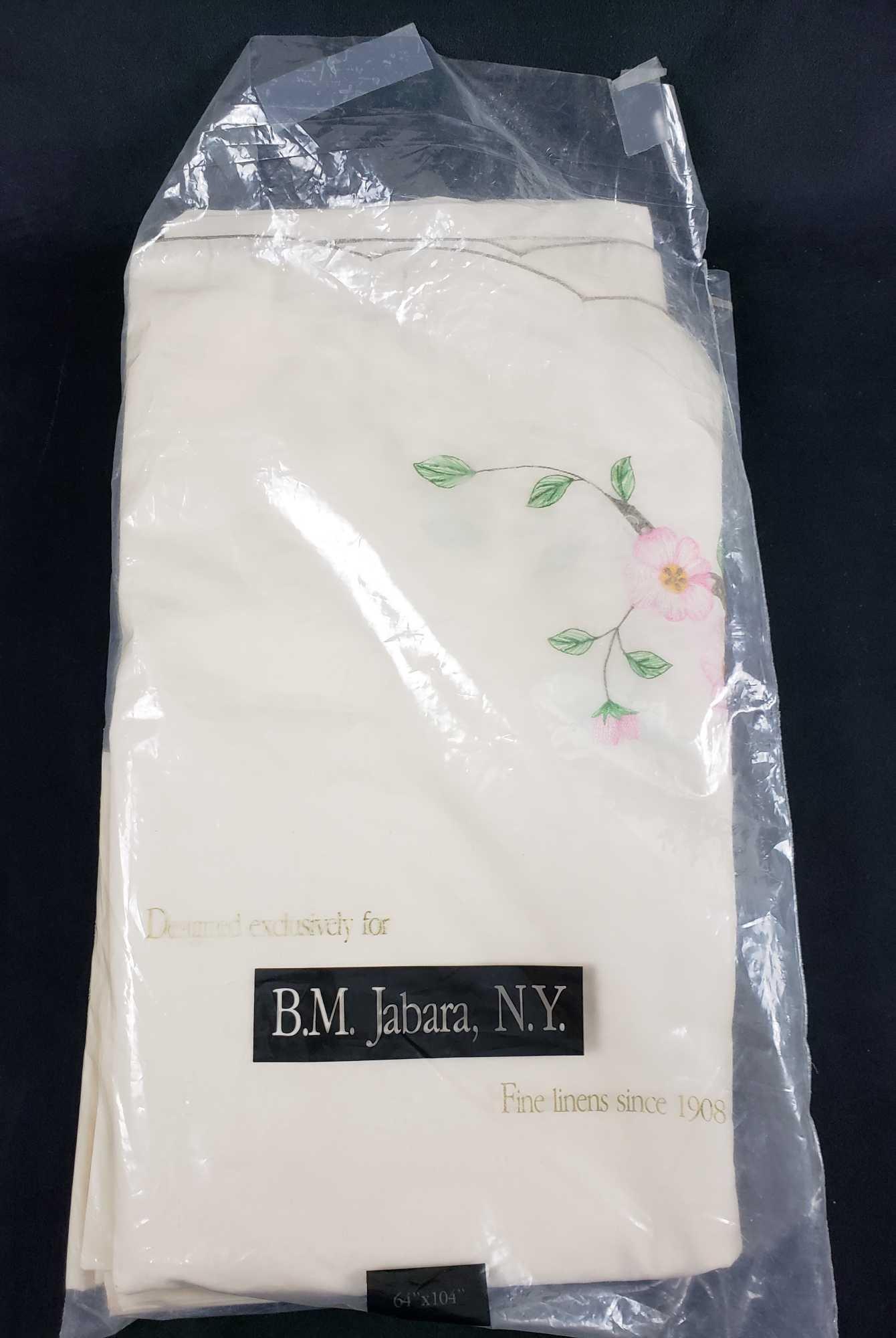 BM Jabara NY Desert Rose Polyester and Cotton Napkin: BM Jabara NY Desert Rose Polyester and Cotton Napkin and Tablecloth Set. This napkin and tablecloth set is in overall great condition. The tablecloth and napkins are still in the original package and