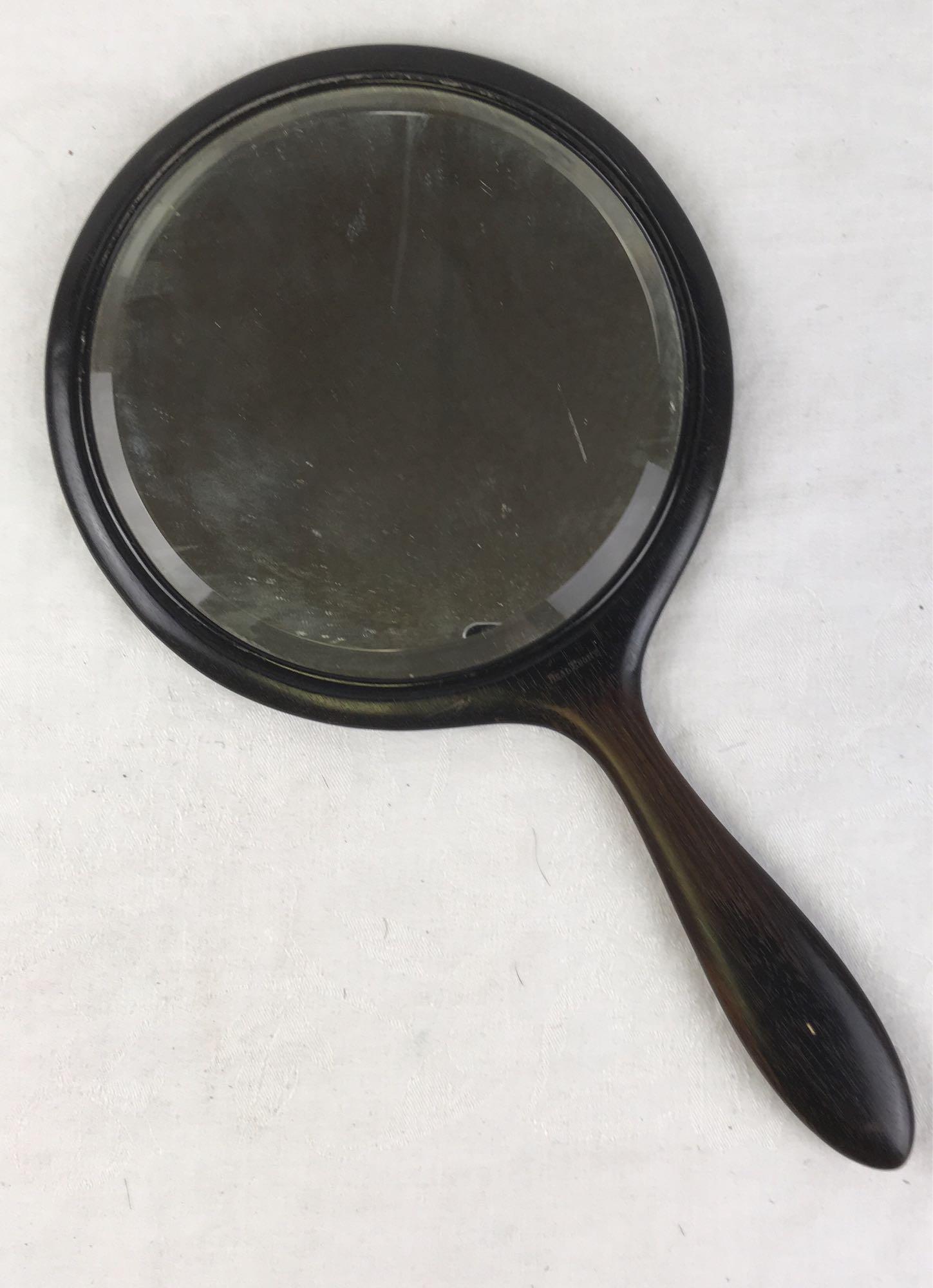 Vintage Ebony Hand Mirror: Vintage Real Ebony Hand Mirror; Measures a 14 3/4" L x 8" W and the mirror itself is 6 3/4" D.Â
