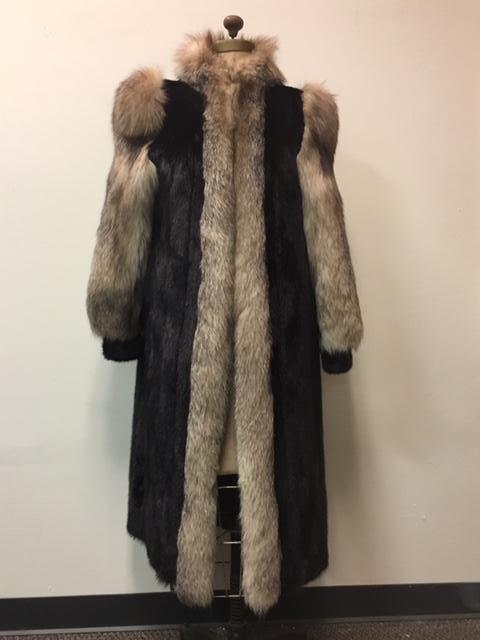 Full Length Mink Fur Coat with Fox Fur Collar and: Full Length Mink Fur Coat with Fox Fur Collar and Sleeve; this coat shows dark mink pelt accented with fox fur. There are four (4)Â clasps and two (2) concealed pockets. The coat shows the embroider