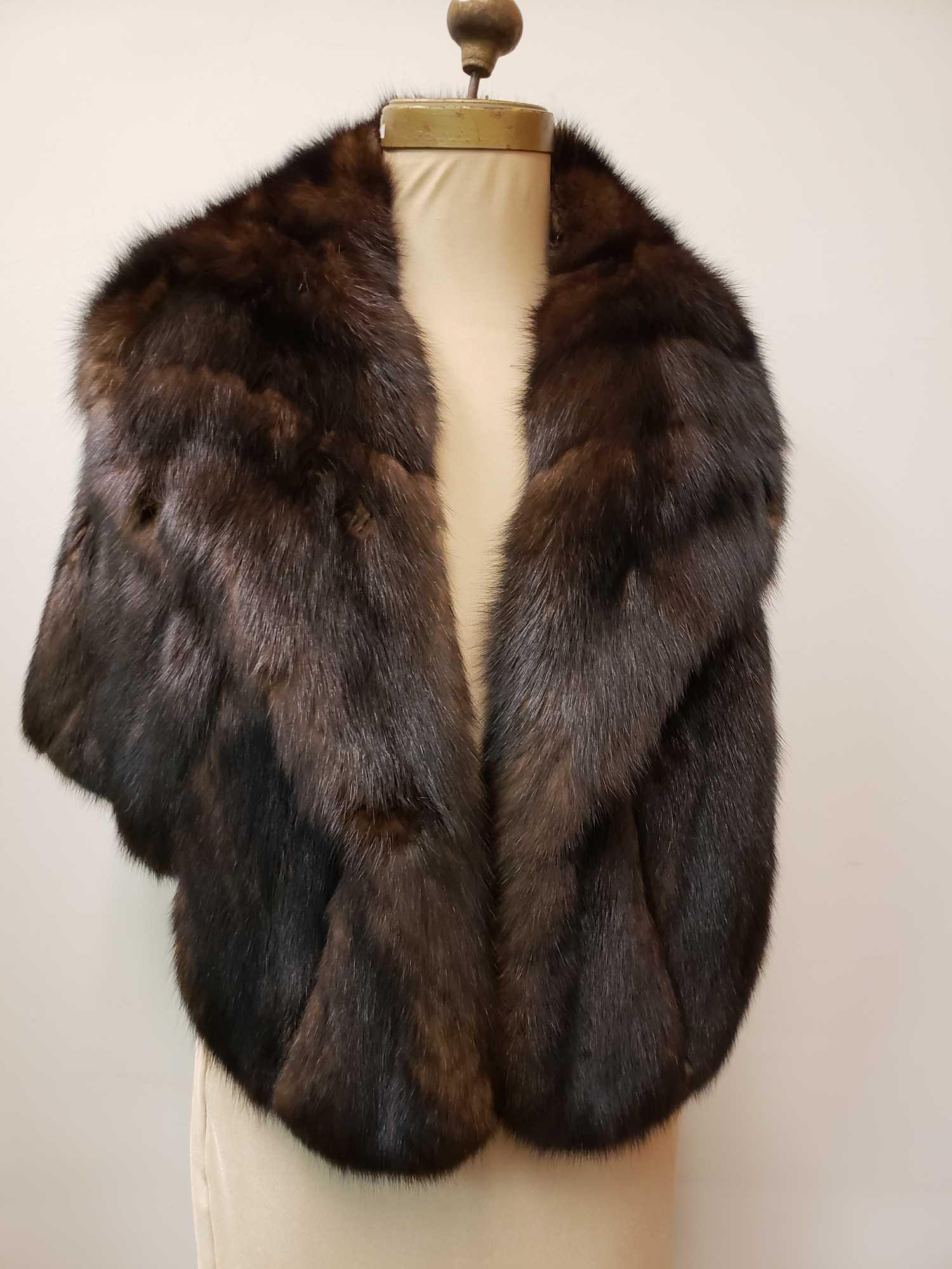 Master Furriers Brown Sable Fur Shawl: Master Furriers Brown Sable Fur Shawl. This shawl is in great used condition. There is no known damage to the interior or exterior of the shawl. The interior is brown fabric with the initials MBW mono