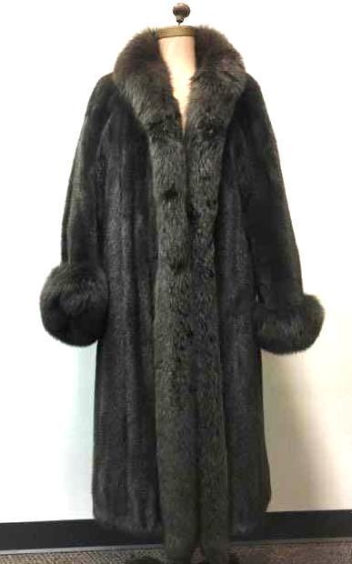 Full Length Mink Fur Coat: Full Length Mink Fur Coat; a soft beautiful coat. The coat shows four (4) clasps and a handkerchief pocket on the right interior flap. The coat shows a full collar and trim down the front, the sleeves