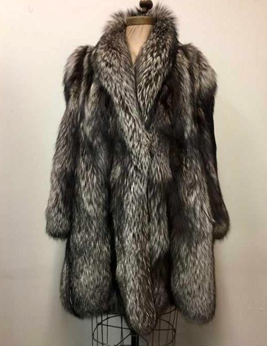 Very Fine Silver Fox Fur Wrap Style Mid Length Coat: Very Fine Silver Fox Fur Wrap Style Mid Length Coat; a soft beautiful coat showing much silver with dark undertones. It shows the label "DOGI Furs", andÂ a single clasp on the front. There are two (
