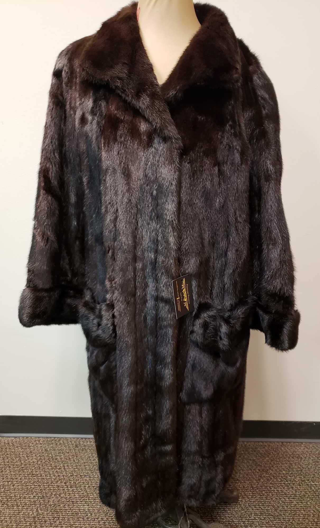Modellkurachnerer Kuhnert Karlsruke Mink Full Length: Modellkurachnerer Kuhnert Karlsruke Mink Full Length Coat. This fur coat is in great used condition. There is no known damage to the interior or exterior of the coat. The interior of the coat is a bro