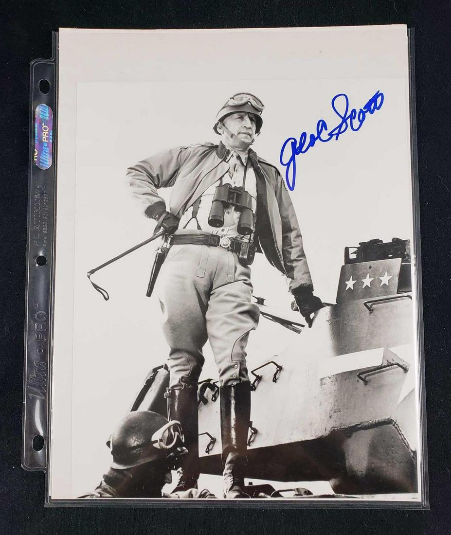 Autographed Press Photo of George C Scott from Patton: Autographed Press Photo of George C Scott from Patton. This press photo is in excellent condition. The signature appears to be authentic and comes with a COA. The photo depicts George C. Scott on the 