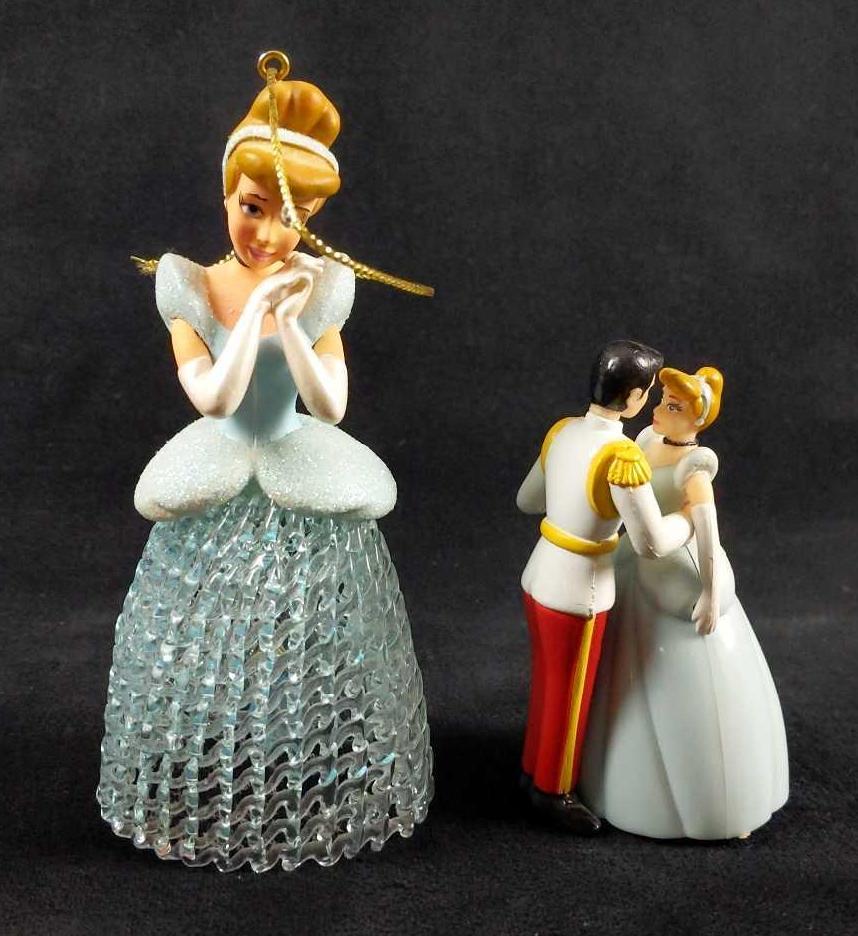 Vintage Cinderella Toy Lot of 2: 1) Vintage Cinderella plastic bell ornament with glitter embellishments. This bell is in good used condition with no known damages. Measurements are 4.5" x 2.5".Â 1) Cinderella and her prince danci