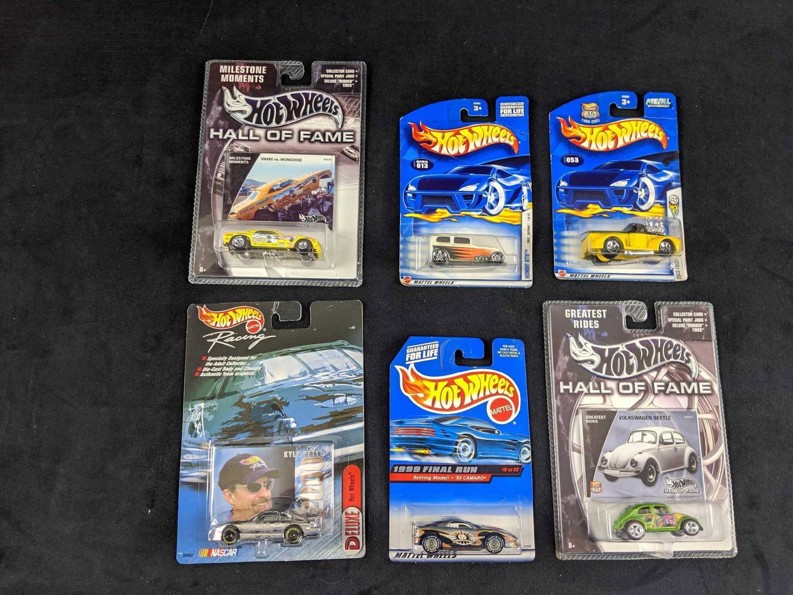 Hot Wheels Lot Of Six Die Cast Cars: This lot includes: 1999 Final Run 93" Camaro, Highway 35 First Editions 1941 Food Pickup, Midnight Otto, Kyle Petty NASCAR Deluxe , Hall Of Fame Volkswagen Beetle, and Hall Of Fame Snake Vs Mongoose