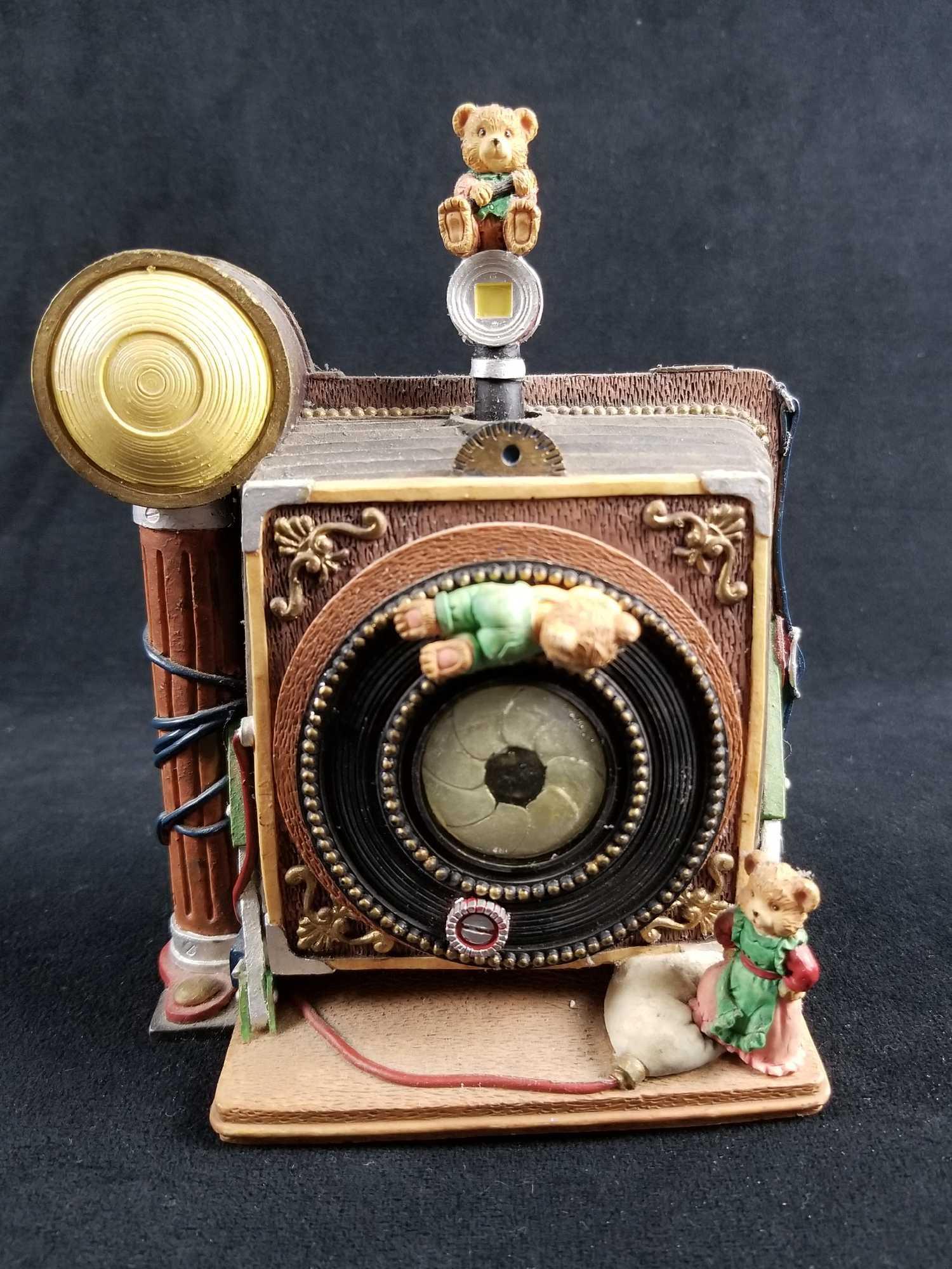 Vintage Kingstate Corp Wind Up Musical Keepsake With: Vintage Kingstate Corp Wind Up Musical Keepsake With Teddy Bears. This adorable little keepsake plays the song "My favorite things" and features an old school camera with little bears hanging off of i