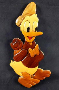 Vintage Donald Duck Wood Grain Cutout Wall Plaque: Vintage wood cutout wall art featuring Donald Duck holding a rose behind his back. This piece has different types of wood staining and showcases the wood grains beautifully. Plaque is in used conditio